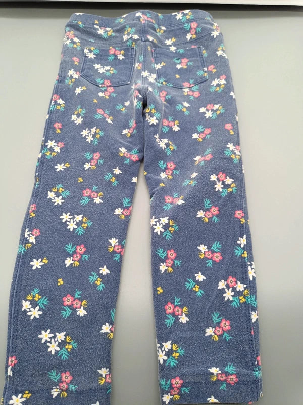 Rückseite der blauen Lupilu Leggings mit buntem Blumendruck