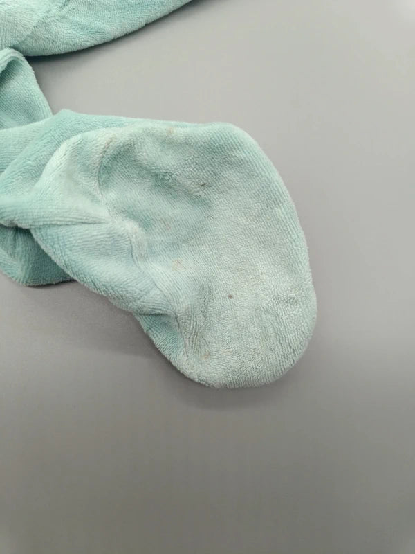 Baby Strampler Fußsohlen Detailfoto Abnutzung