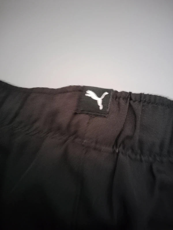 Schwimmshorts schwarz/türkis – Puma (8 Jahre)