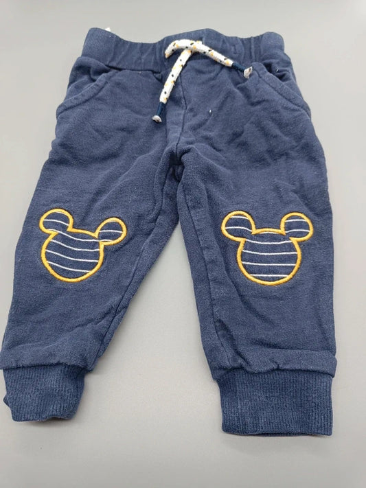 Dunkelblaue Baby-Jogginghose mit gelben Maus-Motiven in Größe 74, Vorderseite