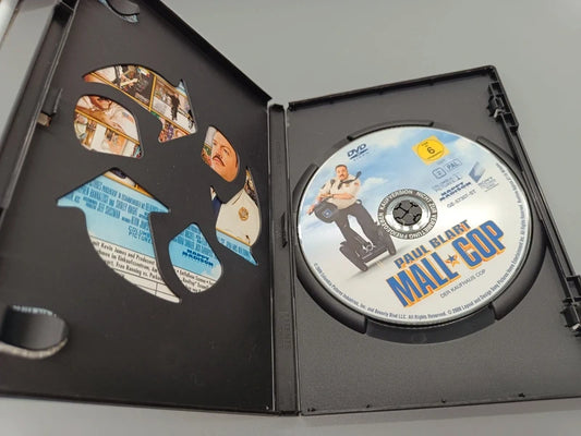 Geöffnete Kaufhaus Cop DVD-Hülle mit Einleger und eingelegtem Datenträger