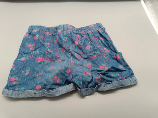 Rückansicht des blau-grauen Shorts-Rocks mit Blumenmuster in Größe 110