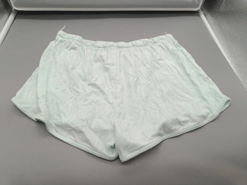 Rückseite der mintgrünen Here + There Sommershorts Größe 170