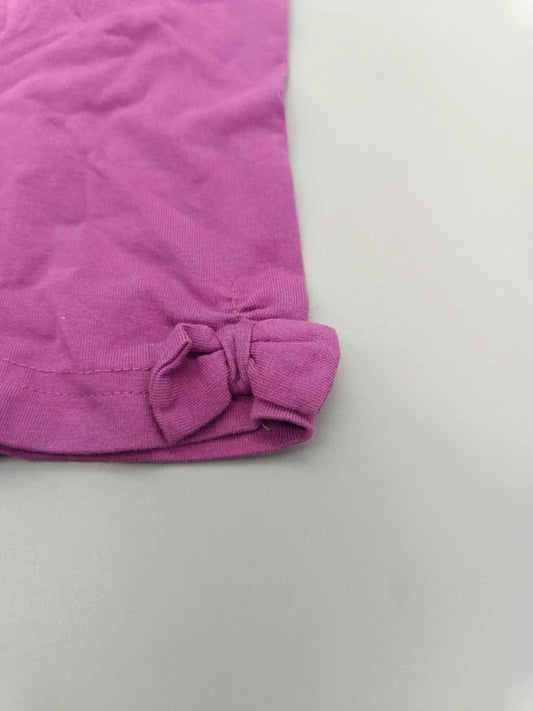 Rückansicht der pinken Mädchen-Shorts mit Schleifen in Größe 62