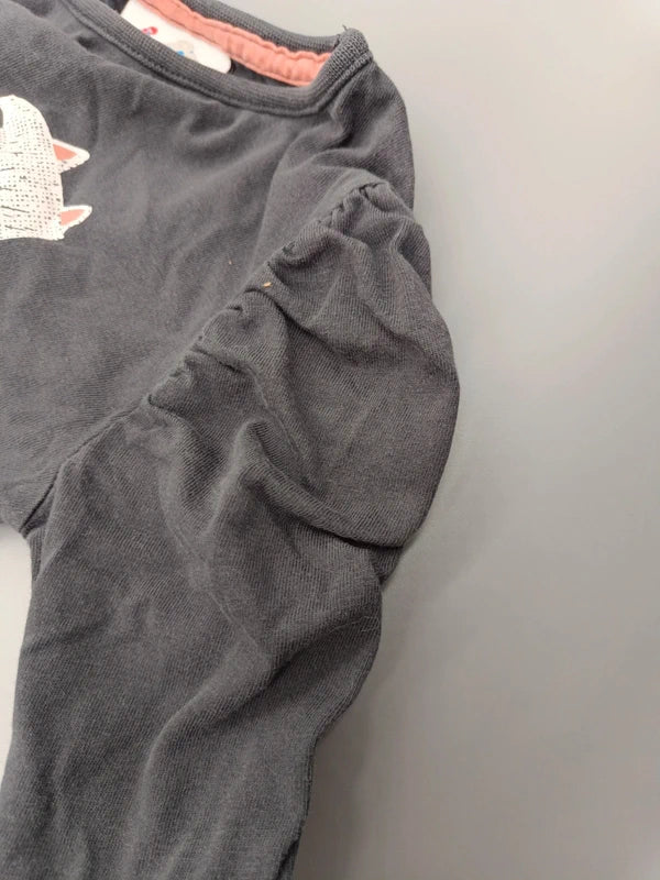 Rückseite des schwarzen Topolino Langarmshirts Größe 98