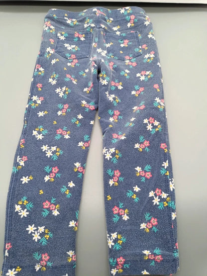 Rückseite der blauen Lupilu Leggings mit buntem Blumendruck