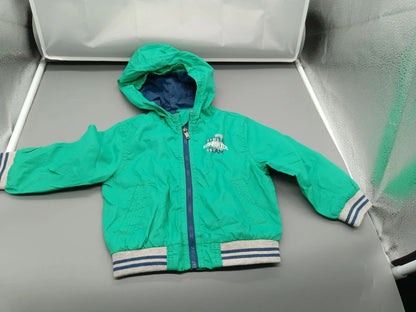 Mintgrüne Impidimpi Baby-Regenjacke Größe 74/80 mit Kapuze, Vorderseite