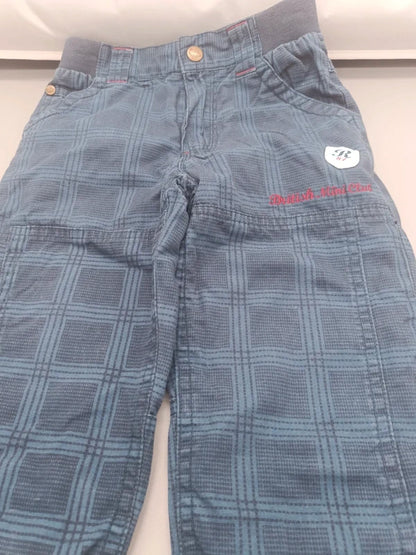 Detail des Karomusters und der Taschen der Topolino Hose