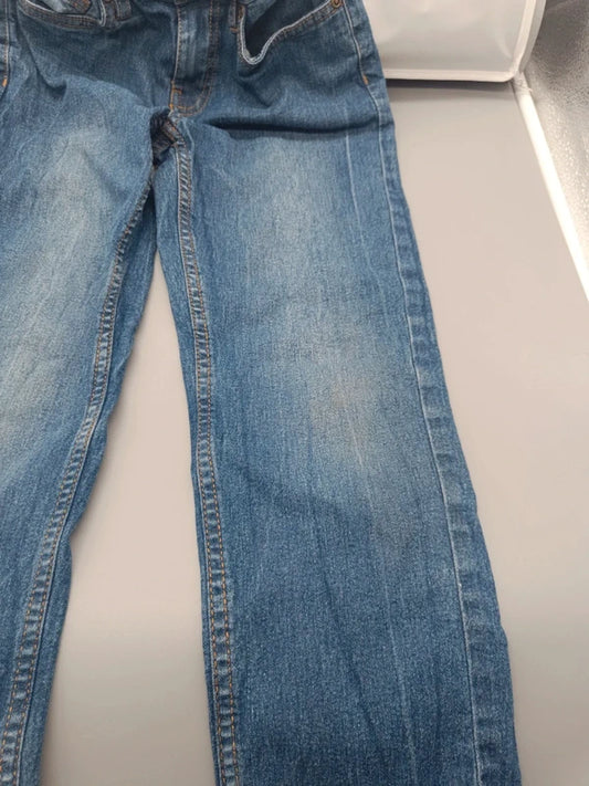 Mädchen Flared Jeans Hellblau Bootcut Bein Nahaufnahme Used-Wash