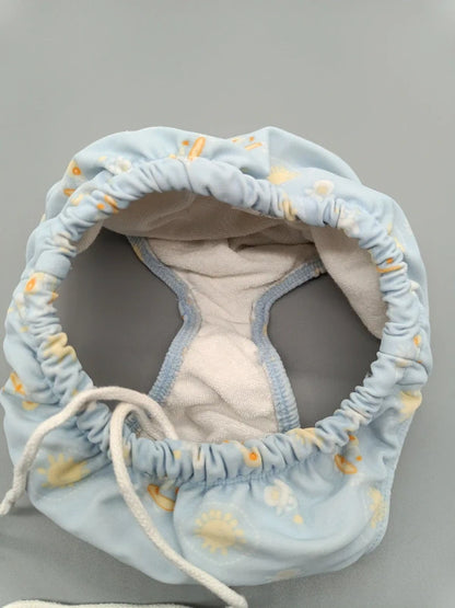 Innenseite der TCM Hose mit hellem Stoff und Kordeldurchzug