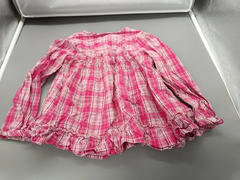 Rückseite der langärmligen pink-weiß karierten Kinderbluse