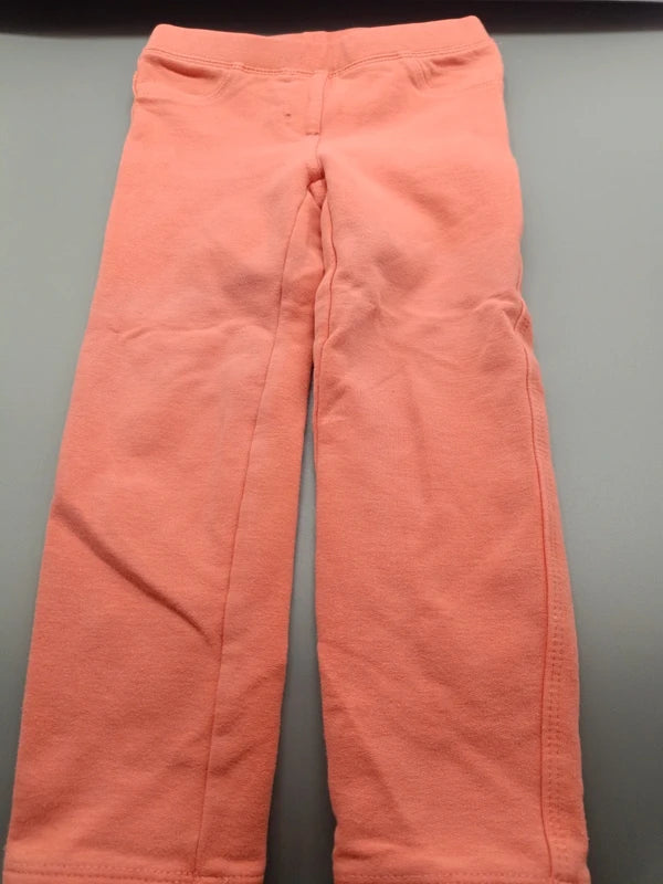 Korallenrote Lupilu Schlupfhose Größe 98/104 mit elastischem Bund und Taschen, Vorderseite