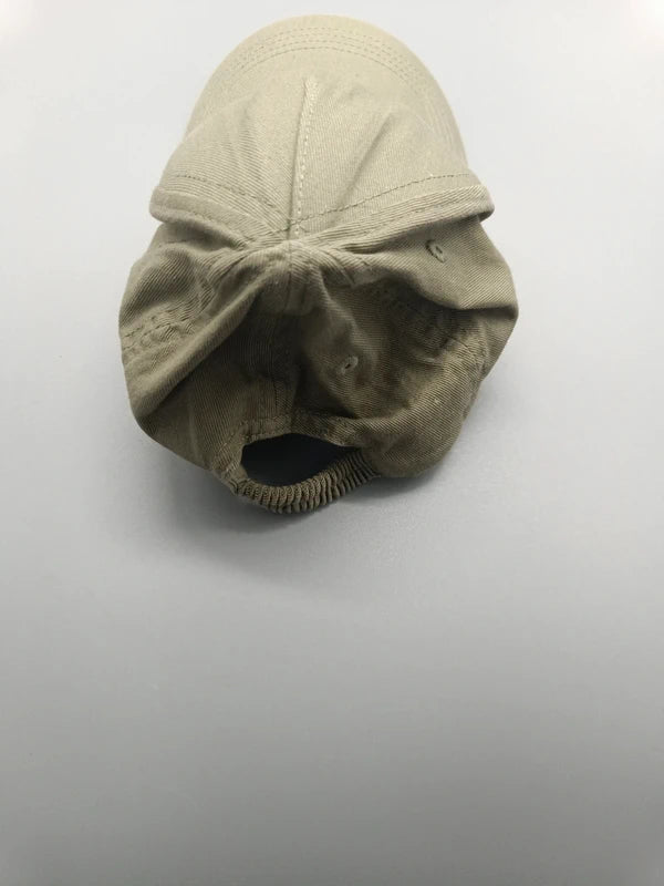 Rückseite der khakifarbenen H&M Cap mit elastischem Einsatz