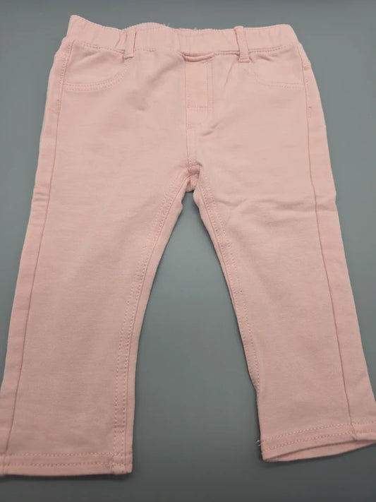 H&M Etikett mit Größe 80 und Innenansicht des Bundes