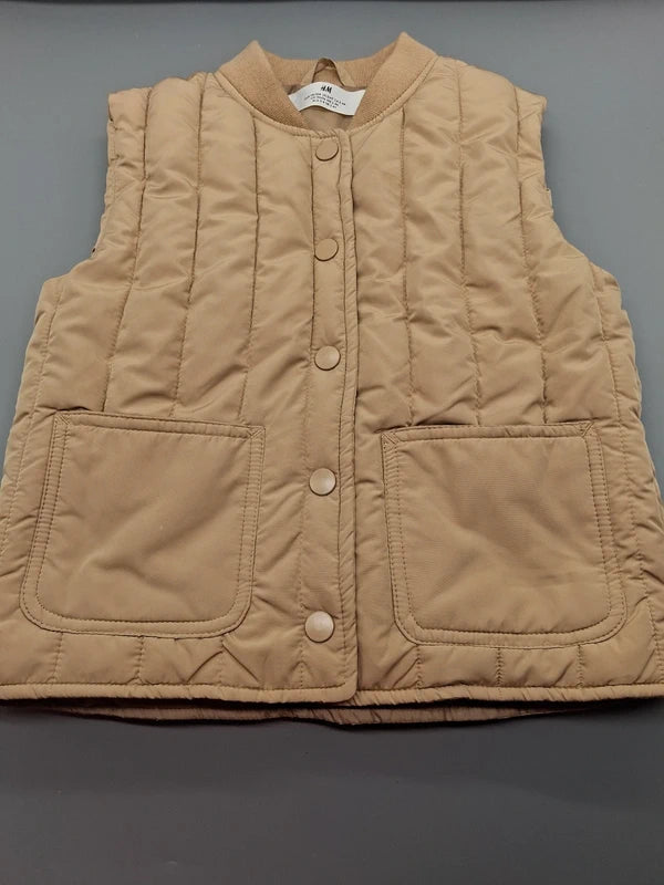 Senffarbene H&M Kinder-Steppweste in Größe 98, Vorderansicht