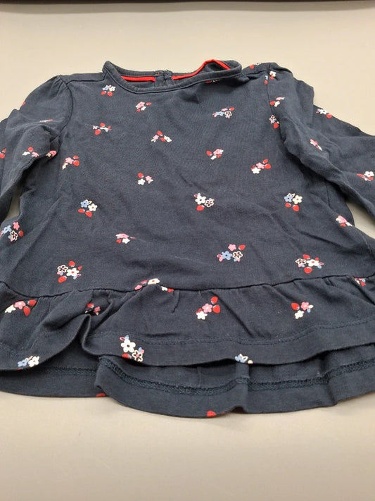 Blumenmuster und Volantsaum des Baby Club Sweatshirts