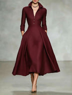 V-neck waist cinched long sleeved dress