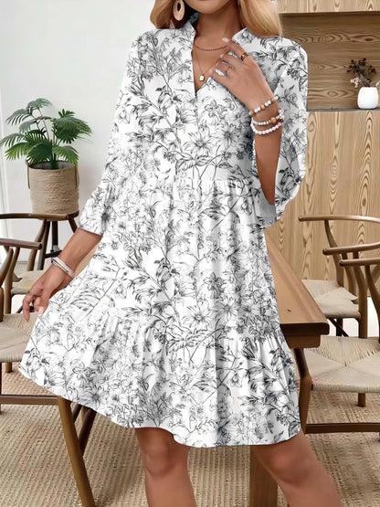 Blumenkleid mit Trompetenärmeln, Seitenansicht