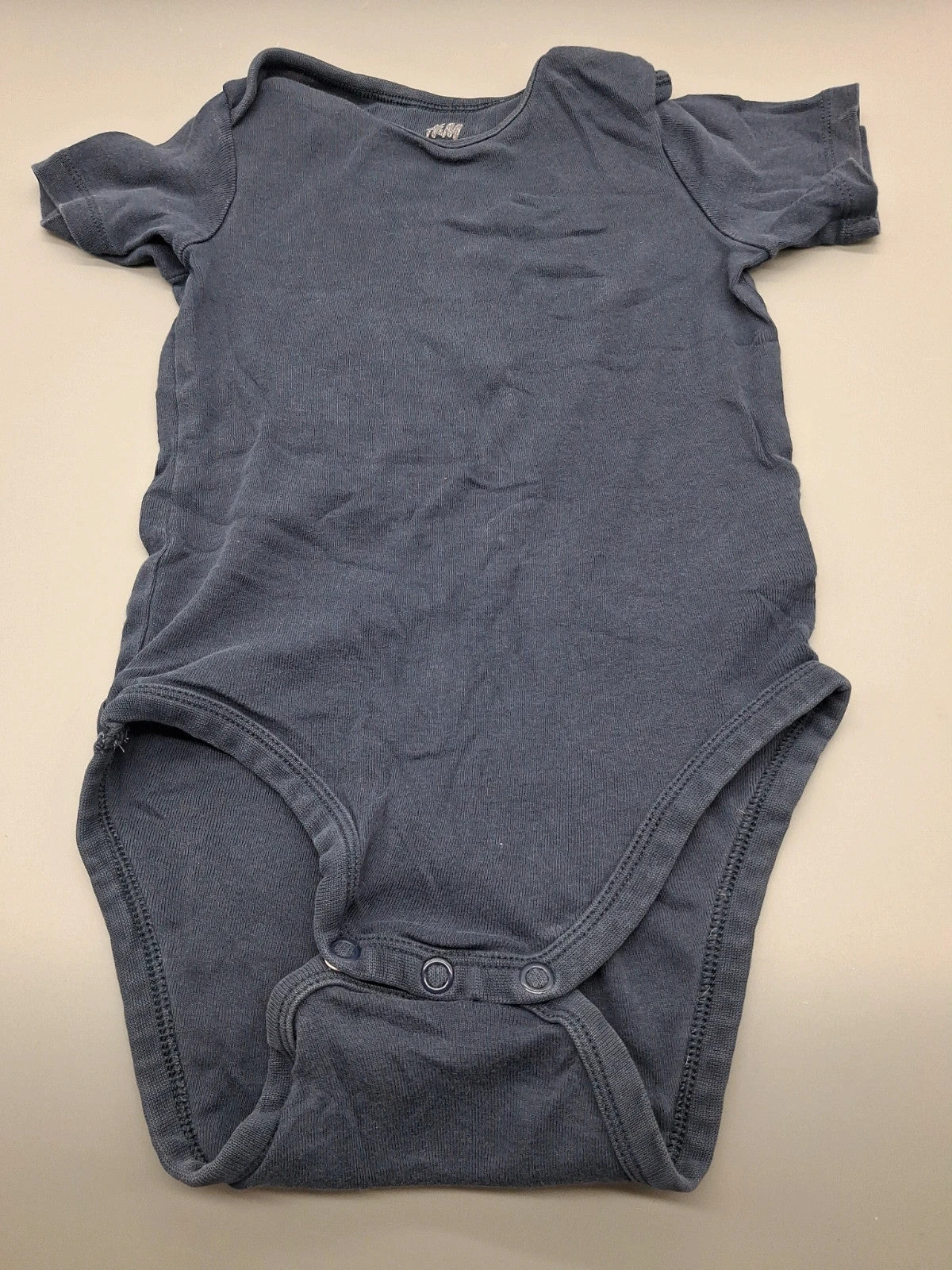 Dunkelblauer H&M Kurzarmbody in Größe 116