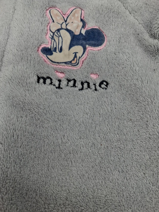 Minnie-Maus-Motiv auf dem Strampler