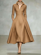 V-neck waist cinched long sleeved dress