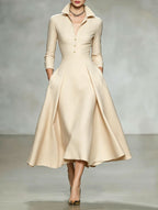 V-neck waist cinched long sleeved dress