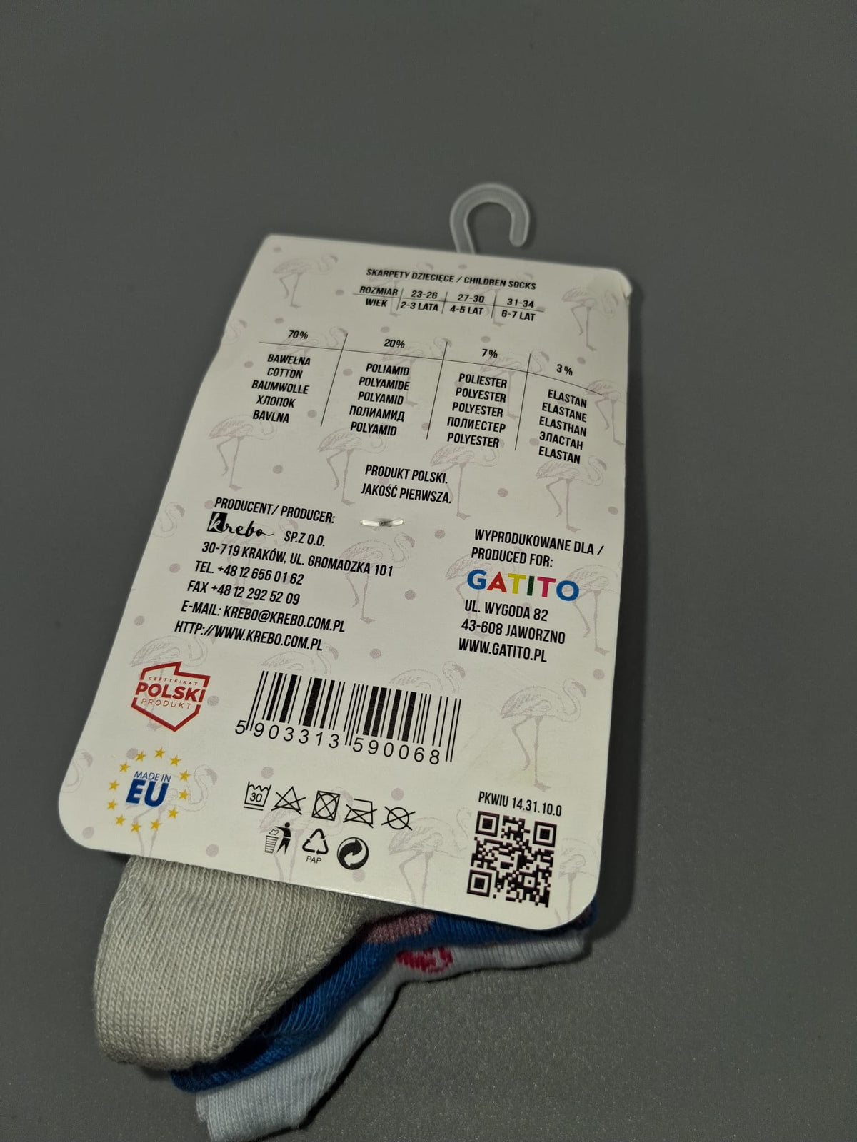 Rückseite der Krebo Sockenverpackung mit Größe 23–26 und Materialzusammensetzung