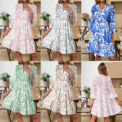 Blumenkleid mit V-Ausschnitt und Trompetenärmeln
